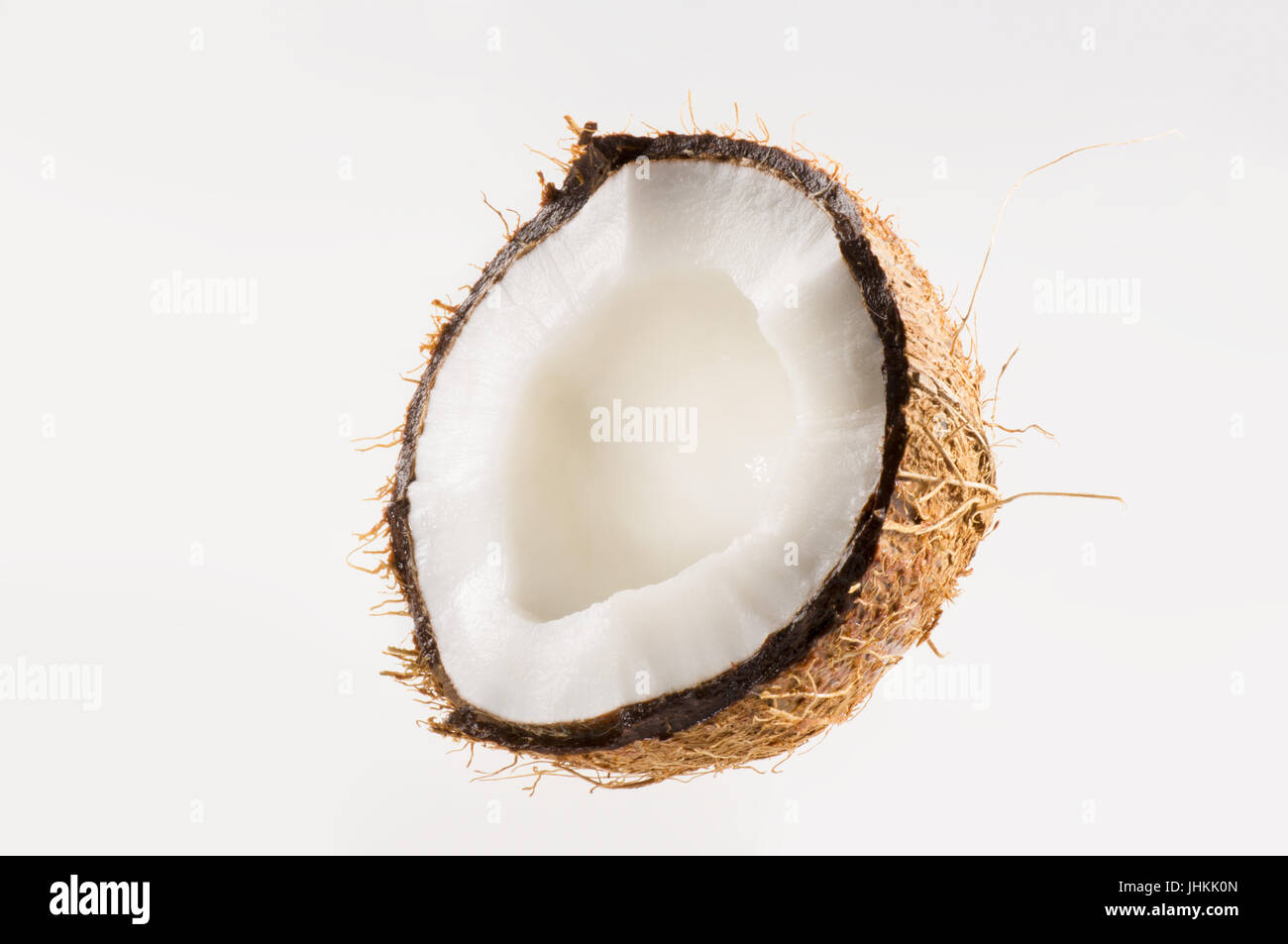 Fresh coconut on white isolated background. Studio shoot. Stock Photo