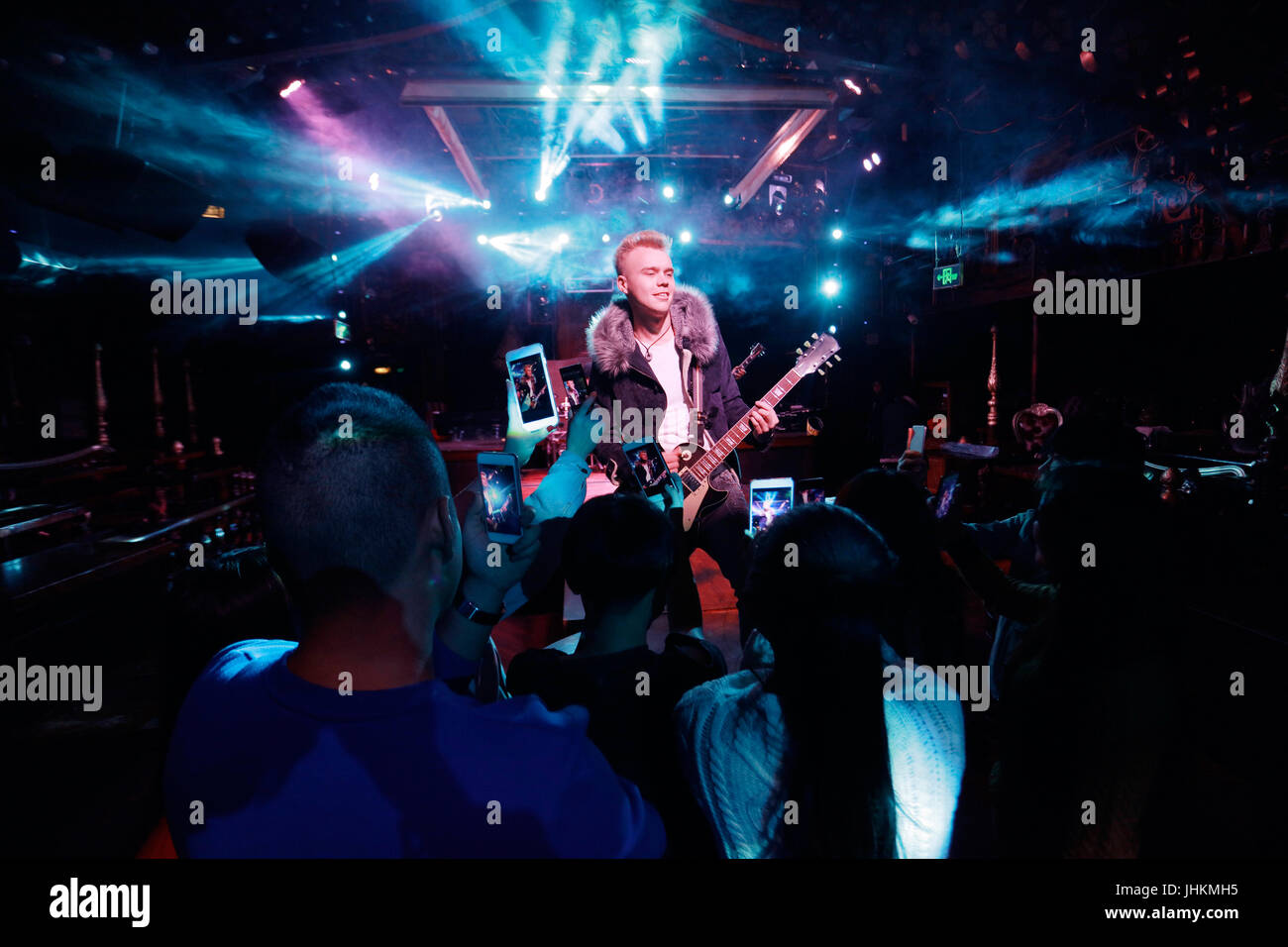 Young people singing and dancing at bar Stock Photo Alamy