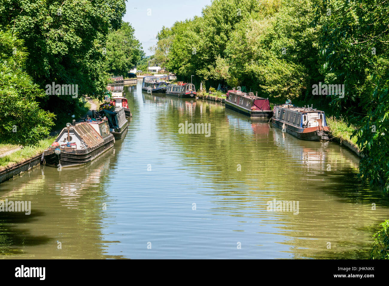 Narrow boats on the Grand Union Canal at Marsworth, in the Vale of Aylesbury, Bucks Stock Photo