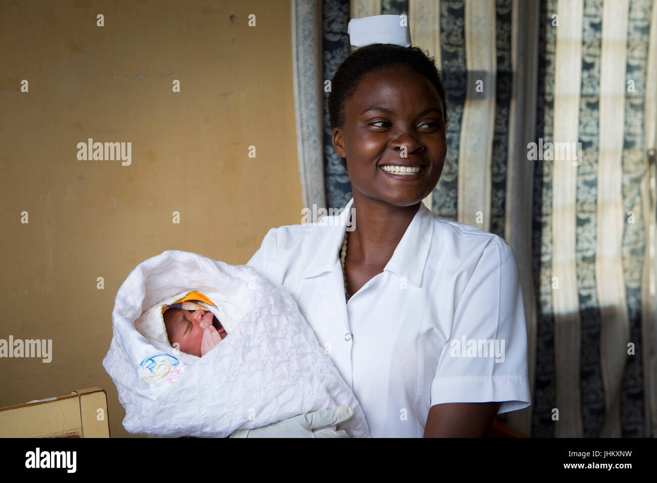 Newborn with nurse uganda hi-res stock photography and images - Alamy