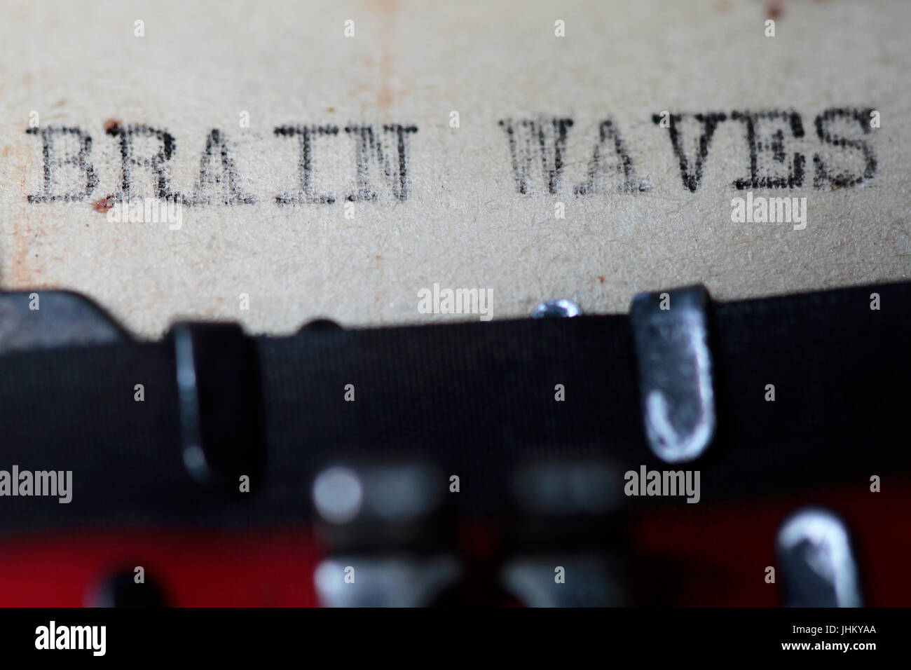 Brain waves typed in an old vintage paper Stock Photo