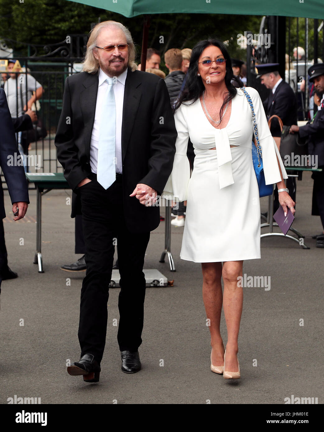 Barry and Linda Gibb arrive on day eleven of the Wimbledon Championships at The All England Lawn Tennis and Croquet Club, Wimbledon. Stock Photo