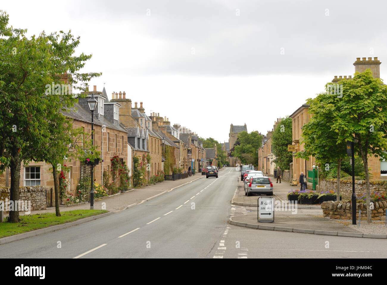 Looking down Castle Street which is the main road through the town of Dornoch in Sutherland, Scotland, UK Stock Photo