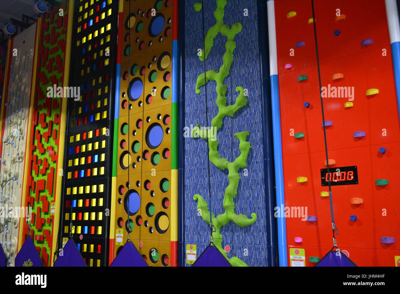 Indoor all weather climbing wall re children kids exercise climb activity adventure Stock Photo