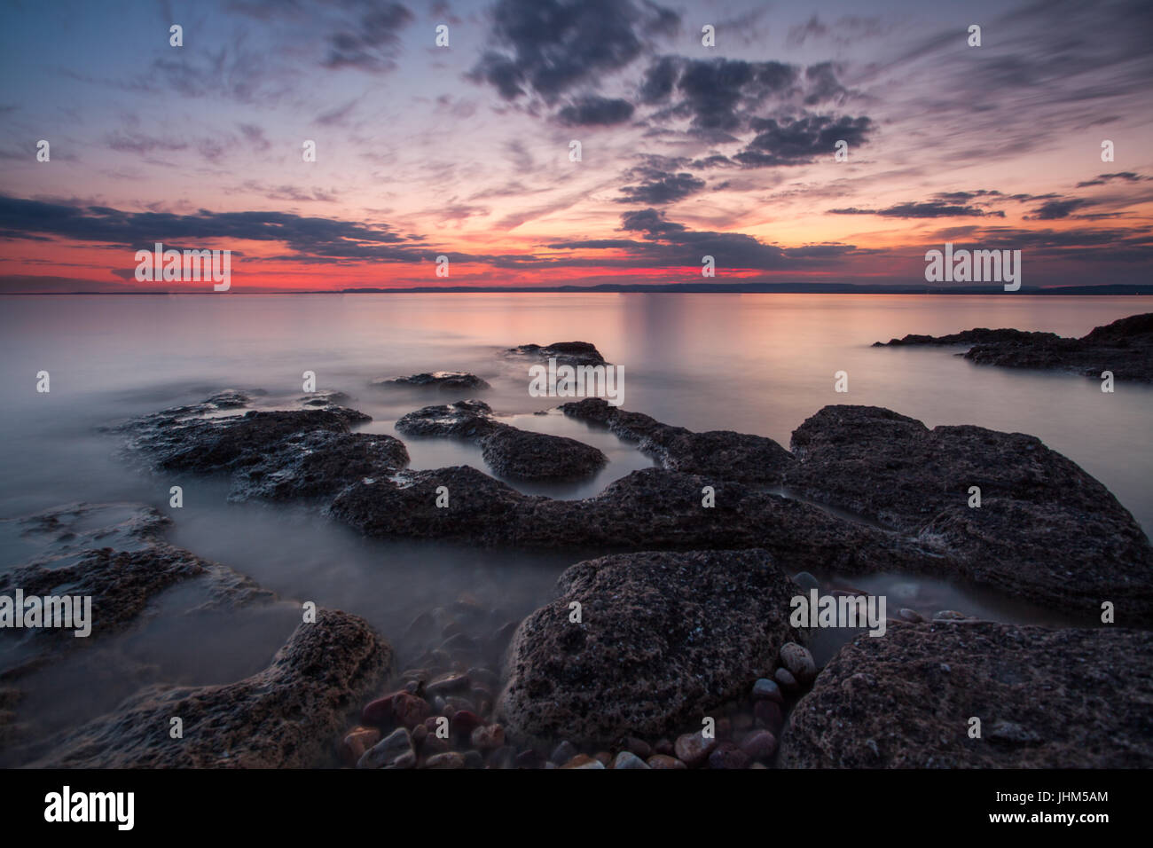 Tranquil sunset seascape Stock Photo