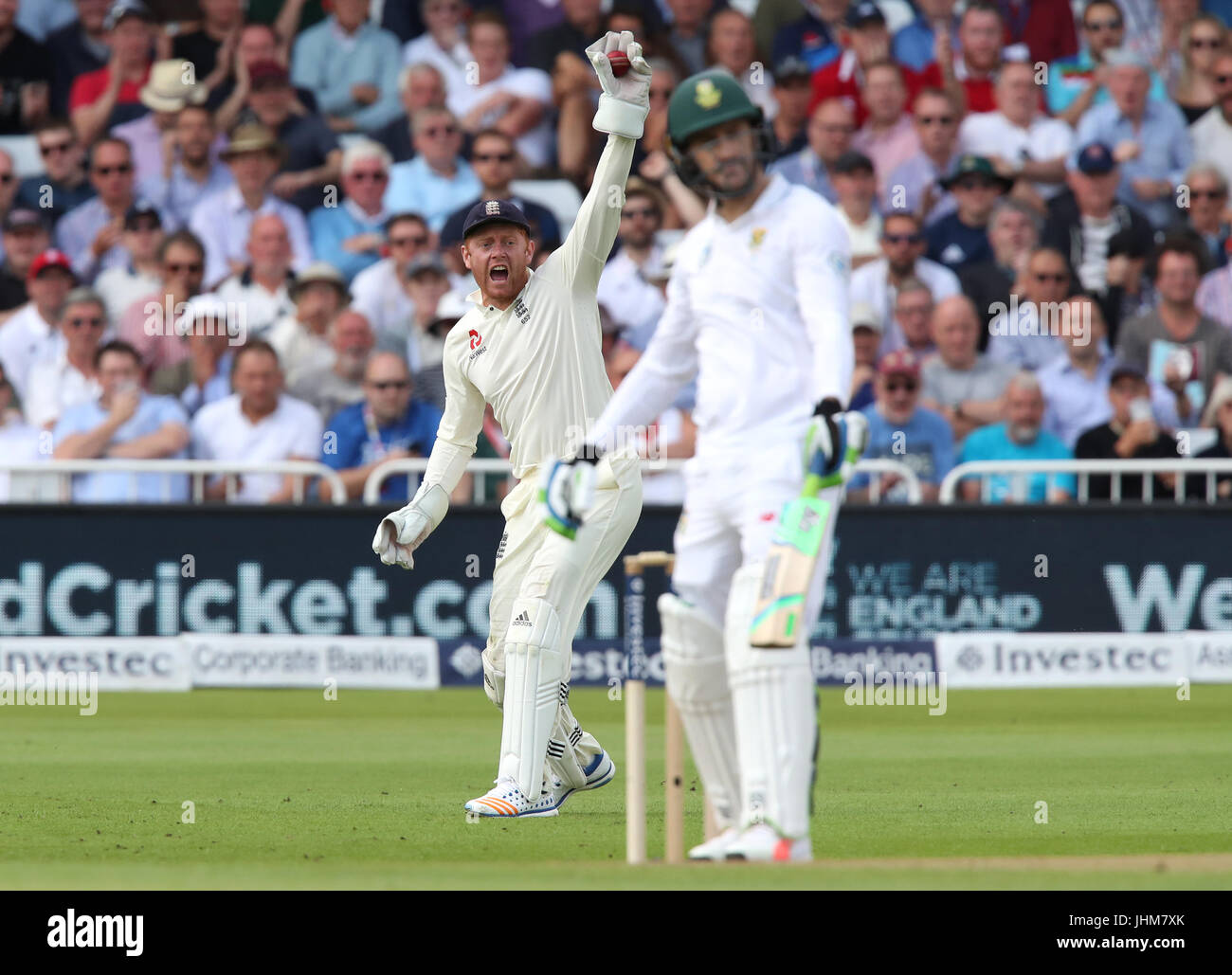 England's Jonny Bairstow celebrates catching out South Africa's Faf du Plessis off the bowling of Ben Stokes during day one of the Second Investec Test match at Trent Bridge, Nottingham. Stock Photo