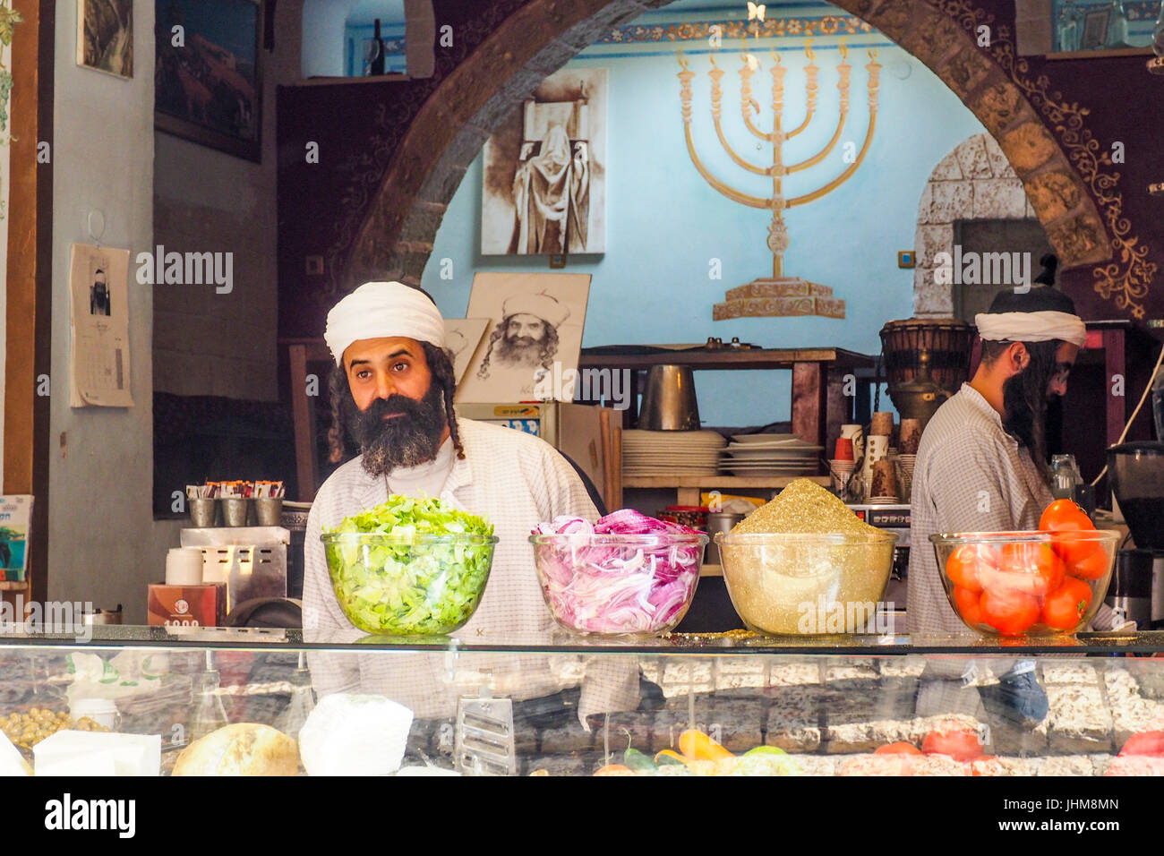 Two Yemenite Jews running a falafel restaurant in Safed, Israel. Stock Photo