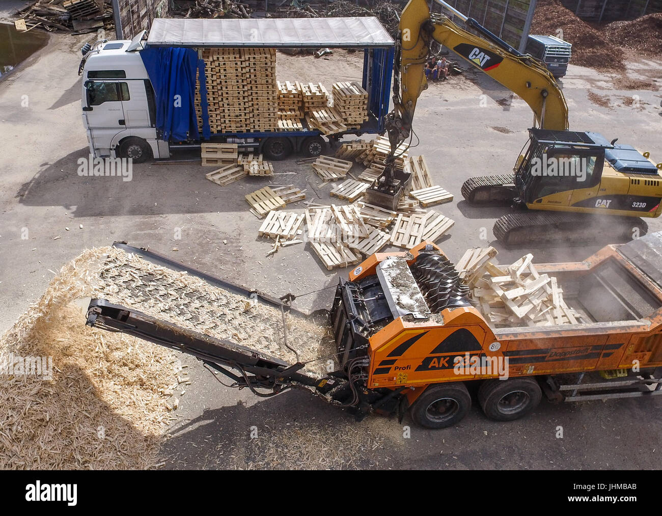 Counterfeit euro-pallets being destroyed in the yard of a recycling ...