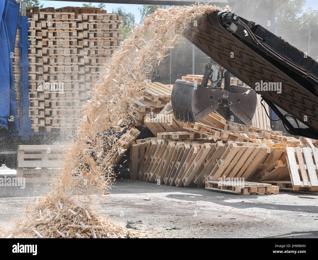 Counterfeit euro-pallets being destroyed in the yard of a recycling ...