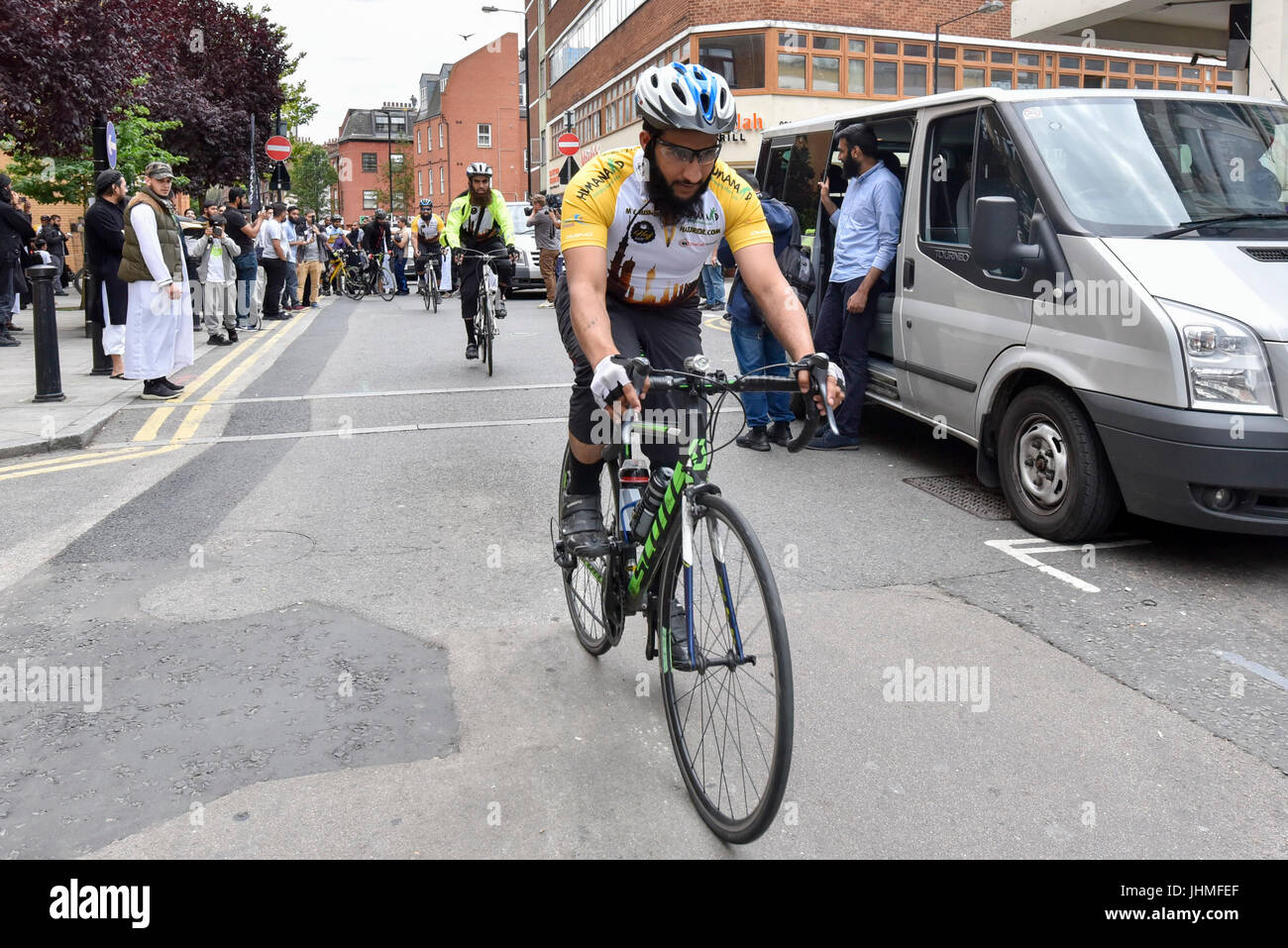 London, UK.  14 July 2017.  Muslim cyclists depart from the East London Mosque in Whitechapel on the 'Hajj Ride', the first ever charity cycle ride from London to Medina in Saudi Arabia.  The 3,500km, 6 week ride will pass through 8 countries raising funds for medical aid in Syria.  Intended to champion cycling in Muslim society, the ride also aims to satisfy one of the five pillars of Islam, being the Hajj pilgrimage to Mecca. Credit: Stephen Chung / Alamy Live News Stock Photo