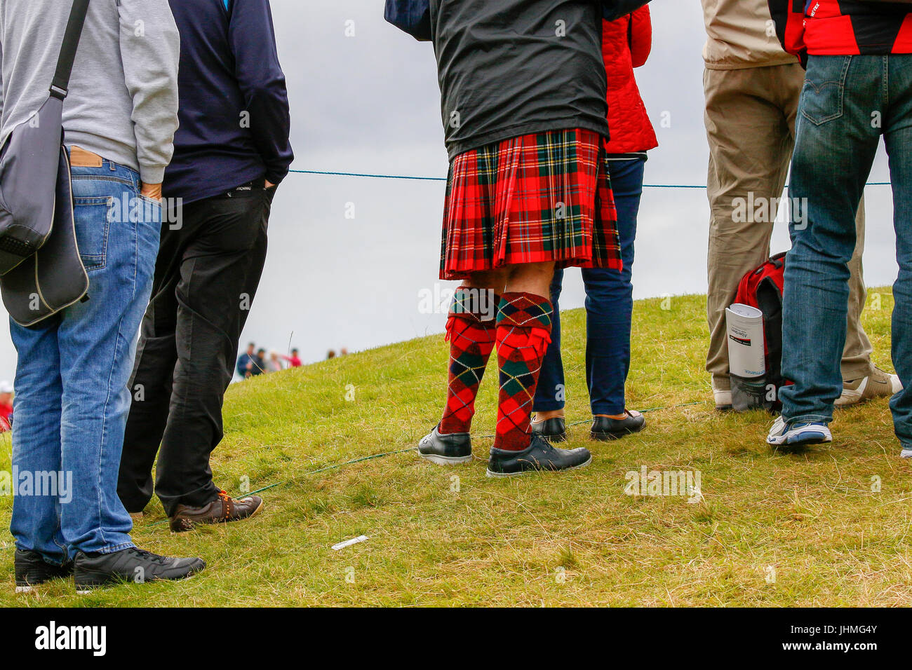 Irvine, Scotland, UK. 14th July, 2017. The organisers of The Scottish Open Golf championship declared the second day to be 'Tartan Day' and asked members of the public, officials and players to wear something tartan if possible. Some agreed to the request. Credit: Findlay/Alamy Live News Stock Photo