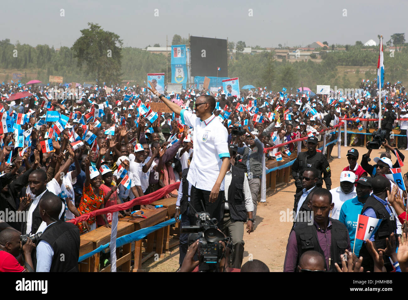 (170714) -- NYANZA (RWANDA), July 14, 2017 (Xinhua) -- Rwandan presidential candidate Paul Kagame (C), the incumbent President of Rwanda, greets his supporters at a presidential campaign rally in Nyanza, Rwanda, on July 14, 2017. Rwanda's presidential campaigns officially kicked off on Friday. The ruling party Rwanda Patriotic Front (RPF)'s presidential candidate Paul Kagame, who is seeking a third term, has launched his campaigns in his childhood home town of Ruhango District, Southern Rwanda. (Xinhua/Gabriel Dusabe) Stock Photo