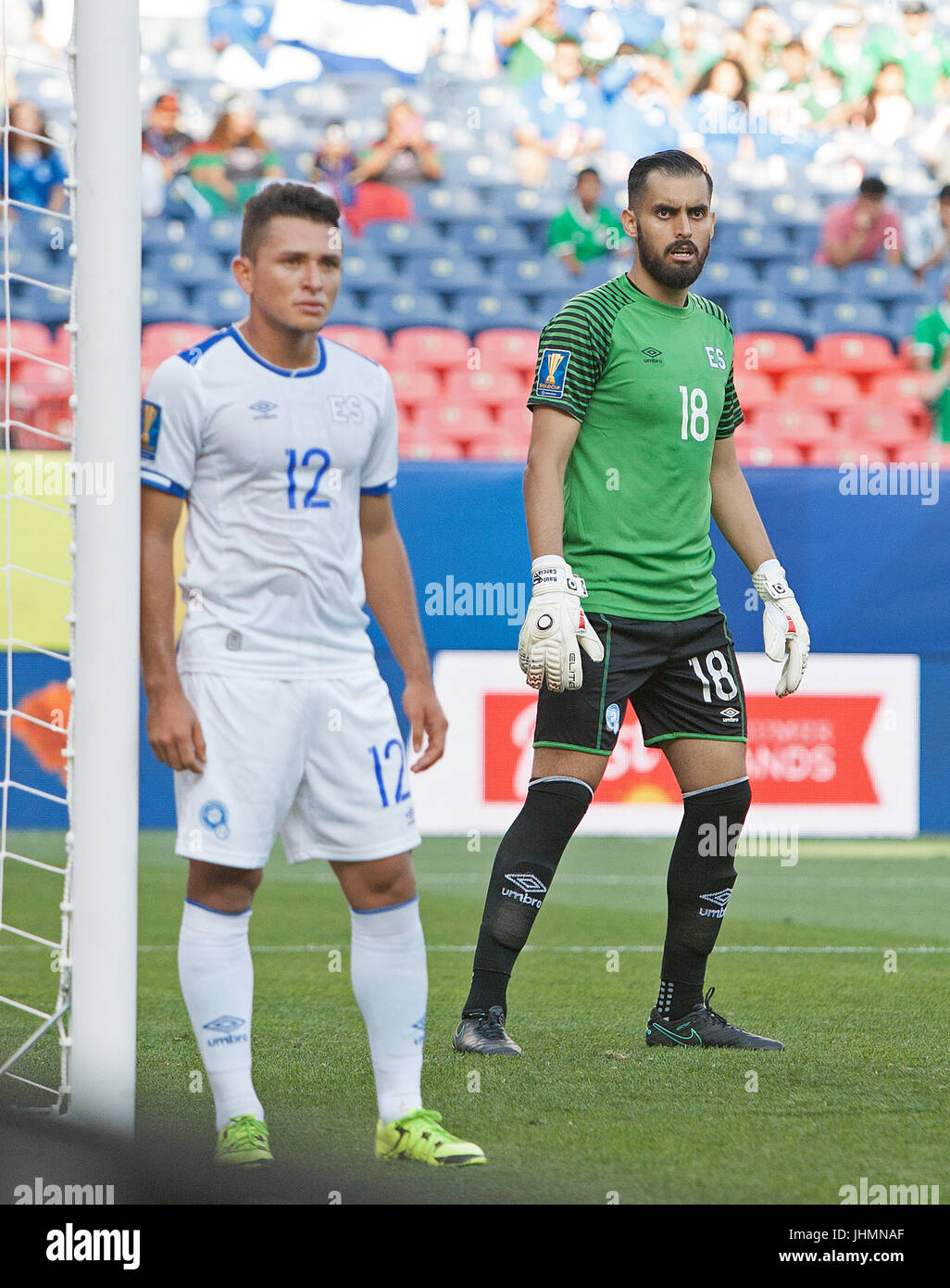 Denver, Colorado, USA. 13th July, 2017. El Salvador G DERBY CARRILLO, right, looks on during a corner kick attempt with team mate MF NARCISO ORELLANA, left, during the 1st. Half at Sports Authority Field at Mile High during the CONCACAF Gold Cup tournament Thursday night. El Salvador beats Curacao 2-0. Credit: Hector Acevedo/ZUMA Wire/Alamy Live News Stock Photo