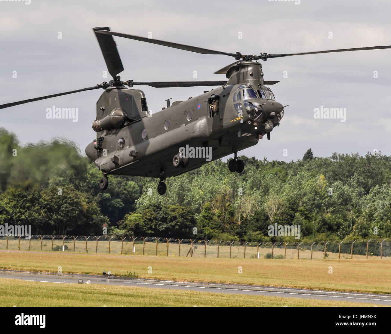 Gloucestershire, UK. 14th July, 2017. Boeing Chinnook HC4 performs a demonstration flight at the Royal International Tattoo ( RIAT) 2017 at Fairford airbase, Gloucestershire Credit: jules annan/Alamy Live News Stock Photo