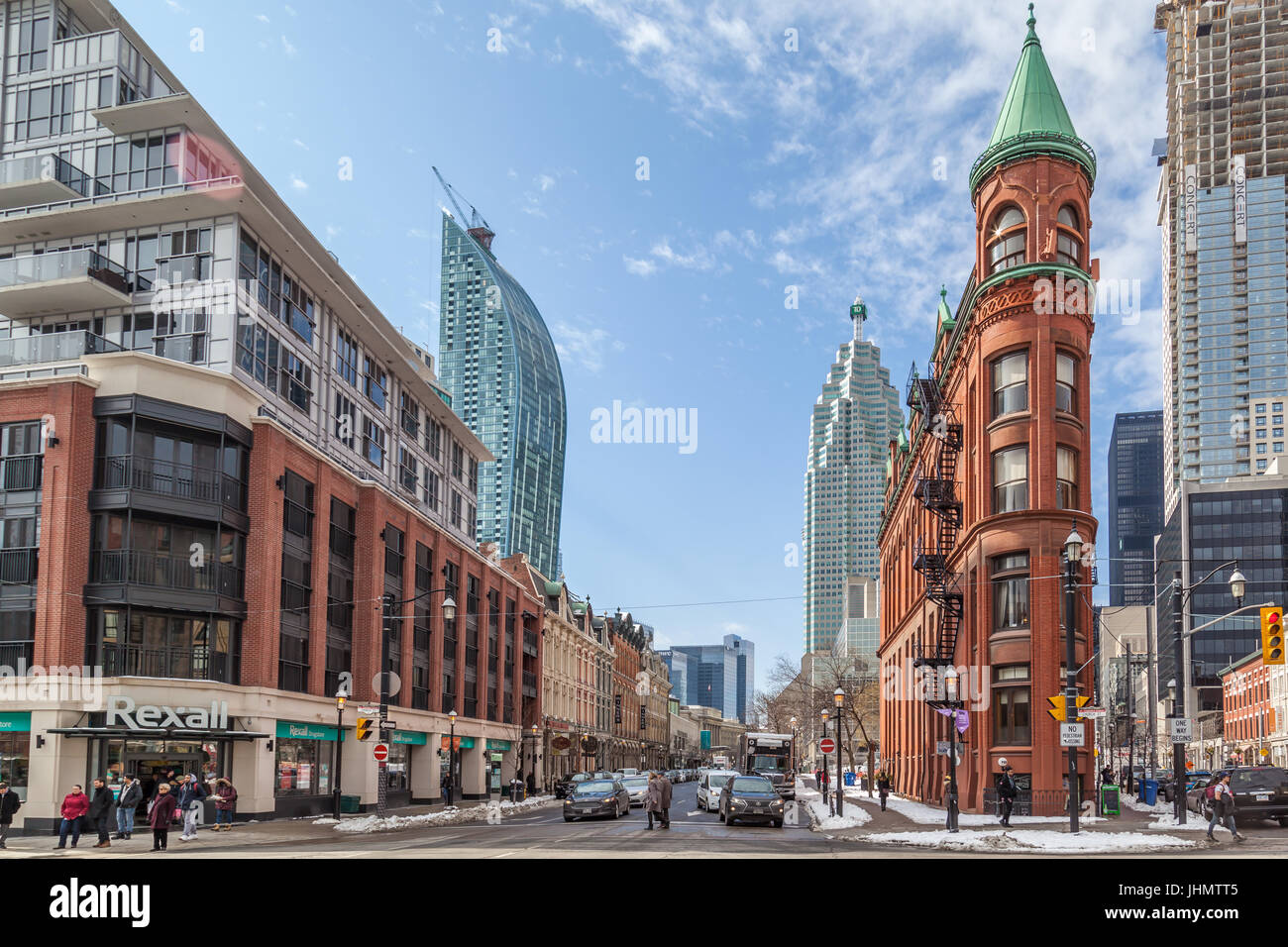 Red-brick Gooderham Building with street view in background , Gooderham Building is a historic landmark of Toronto, O Stock Photo