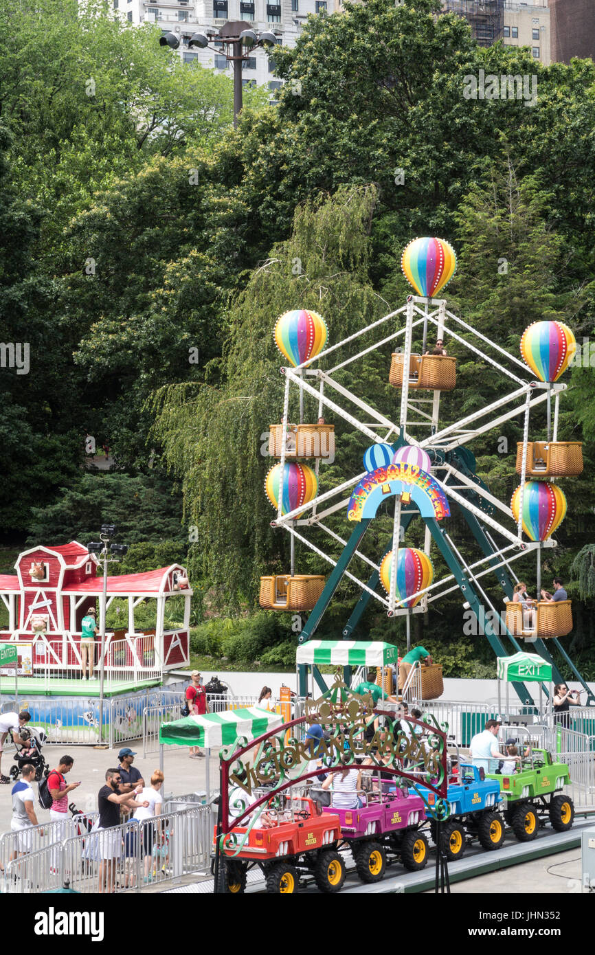 Victorian Gardens Carnival Rides In Central Park With Skyline In