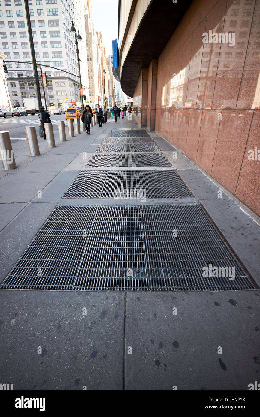 underground subway ventiliation grilles in sidewalk New York City USA Stock Photo