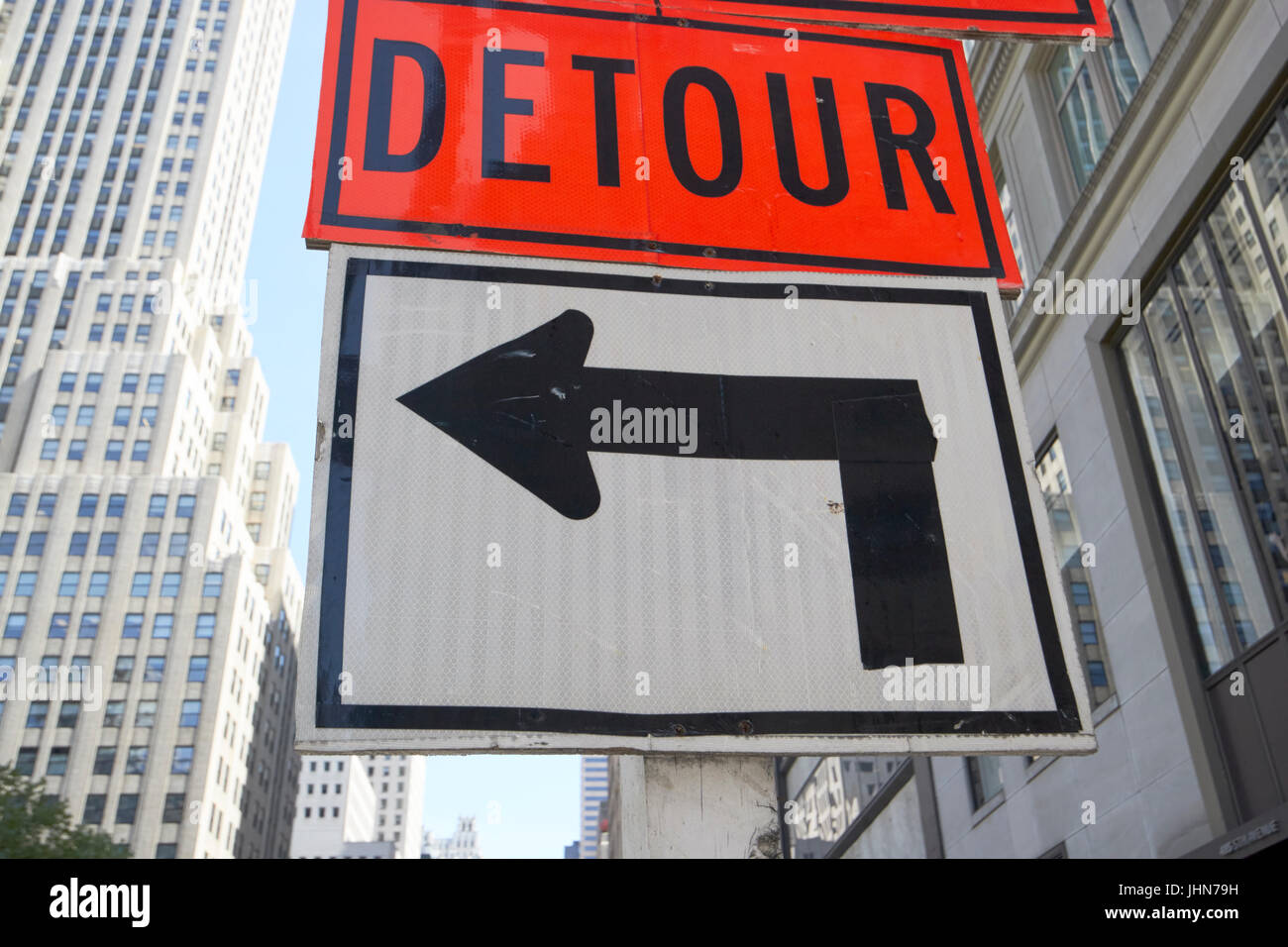 detour sign with left turn arrow midtown New York City USA Stock Photo