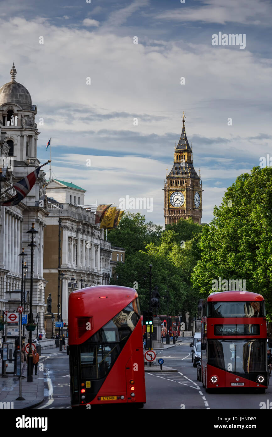 Big Ben and red double-decker buses on Whitehall Street, London, England, United Kingdom Stock Photo