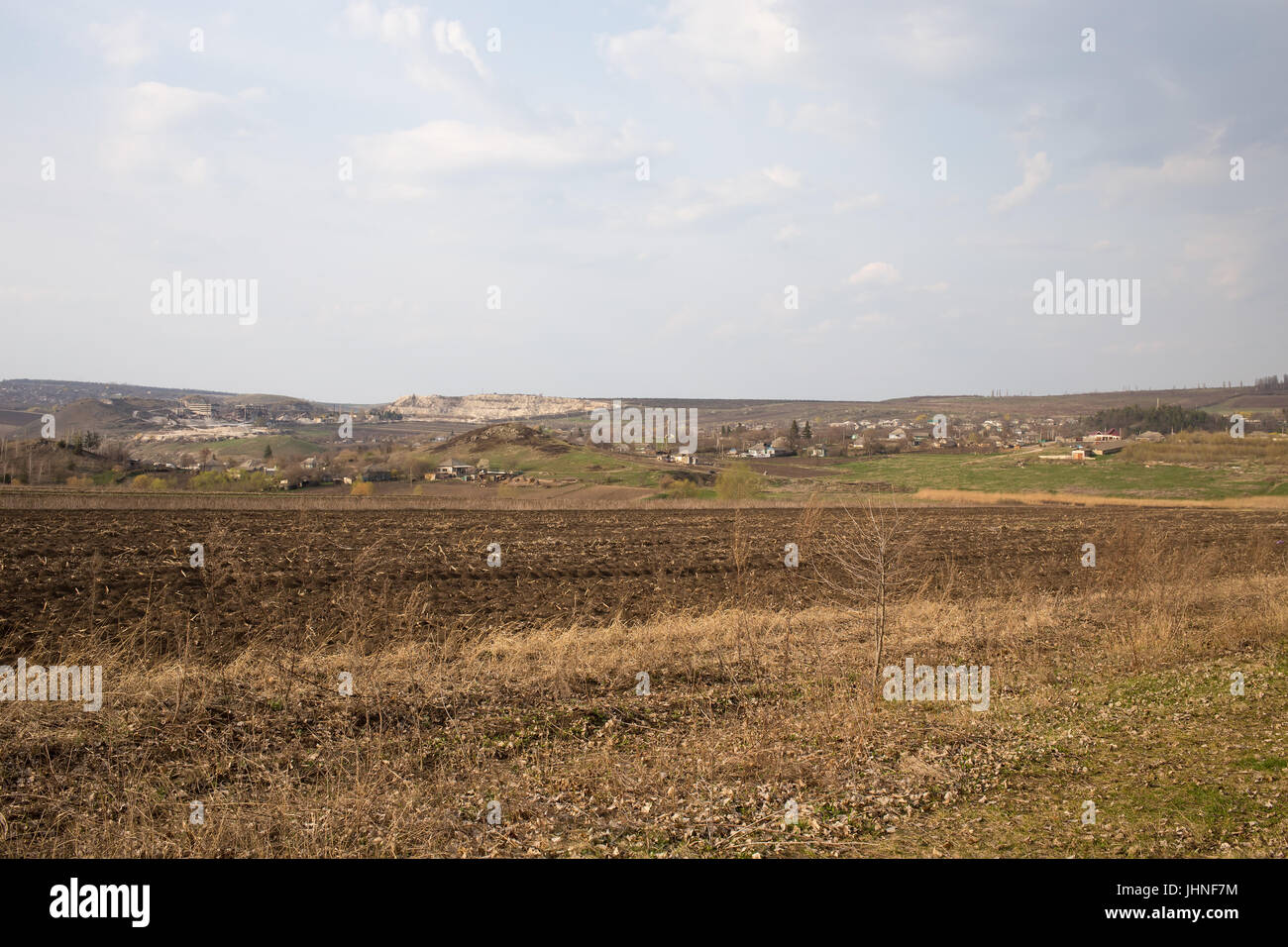 Landscape with beautiful view of village and fields Stock Photo - Alamy