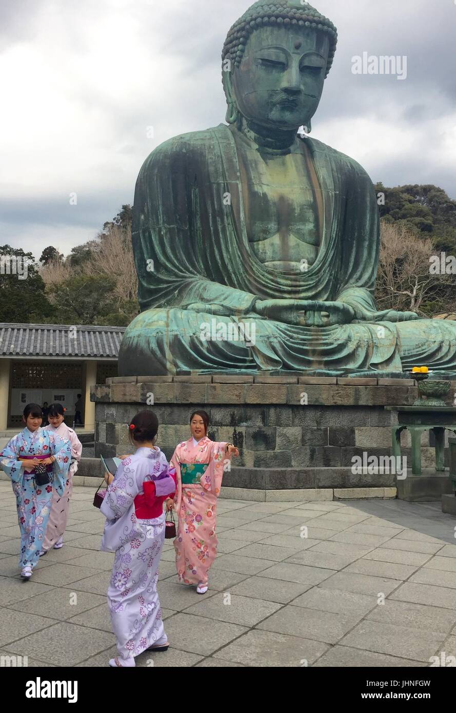 Buddha and Japanese geisha girls Stock Photo