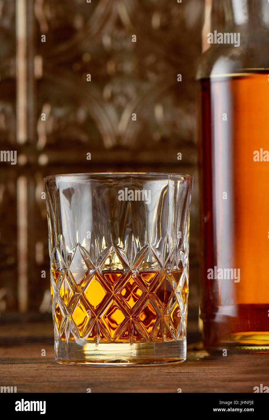 Glass of Scotch whiskey in crystal glass Stock Photo