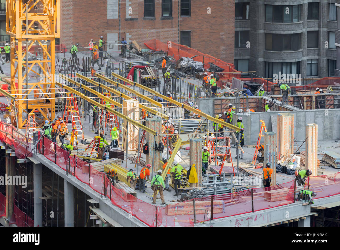 a busy construciton site on a high-rise building on the upper west side of manhattan Stock Photo