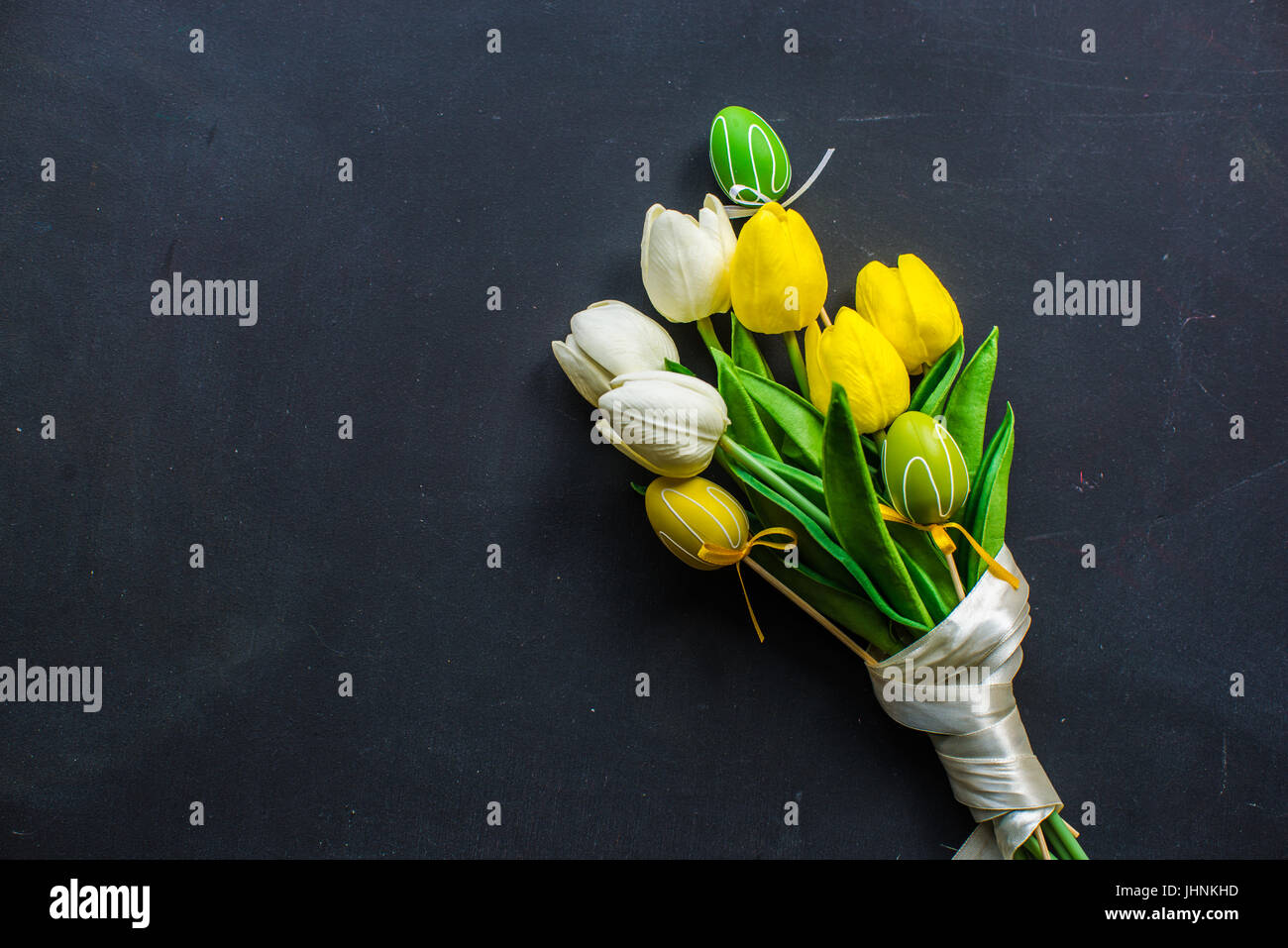 Easter frame with tulips and easter eggs on dark background Stock Photo ...