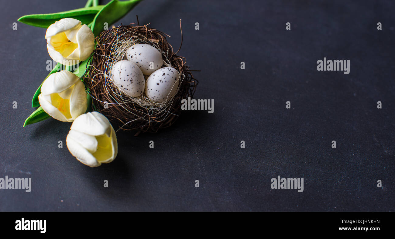 Easter frame with tulips and easter eggs on dark background Stock Photo ...