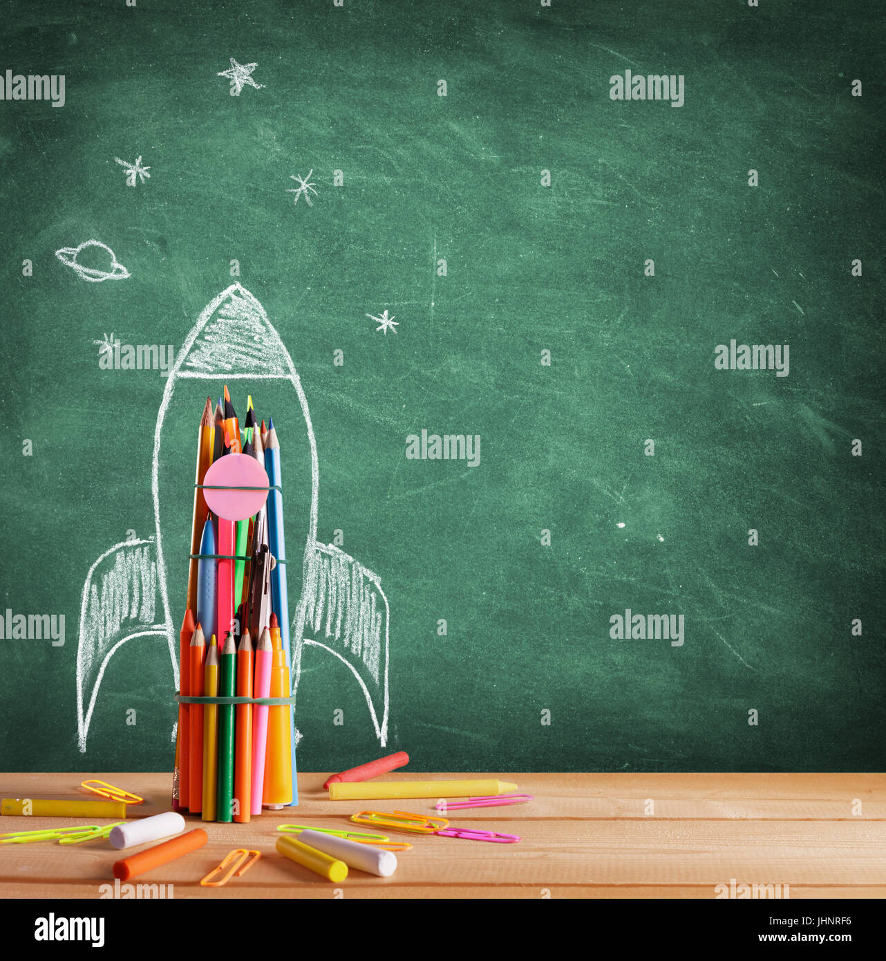 Back To School - Rocket Sketch On Blackboard Stock Photo