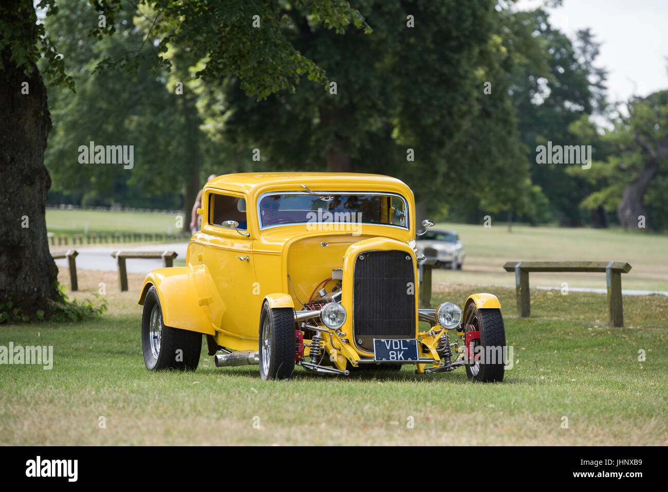 Yellow Custom Ford Hotrod at Rally of the Giants american car show, Blenheim palace, Oxfordshire, England. Classic vintage American car Stock Photo