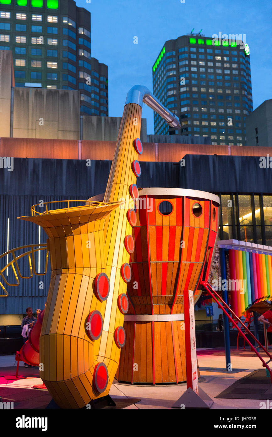 Canada,Quebec, Montreal, Montreal Jazz Festival, Place Des Festival ,childresn play station with oversize musical instruments Stock Photo