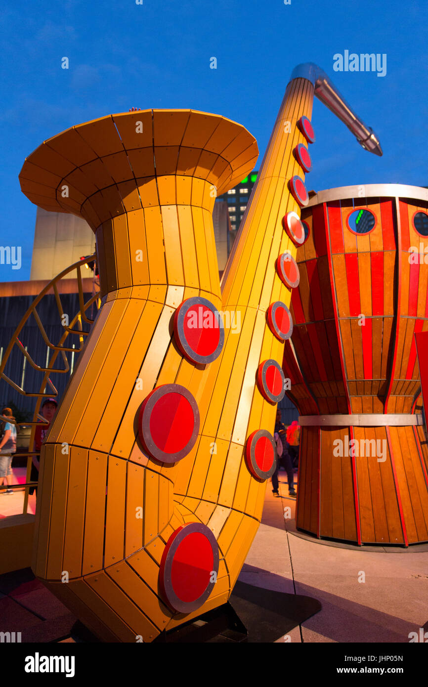 Canada,Quebec, Montreal, Montreal Jazz Festival, Place Des Festival ,childresn play station with oversize musical instruments Stock Photo