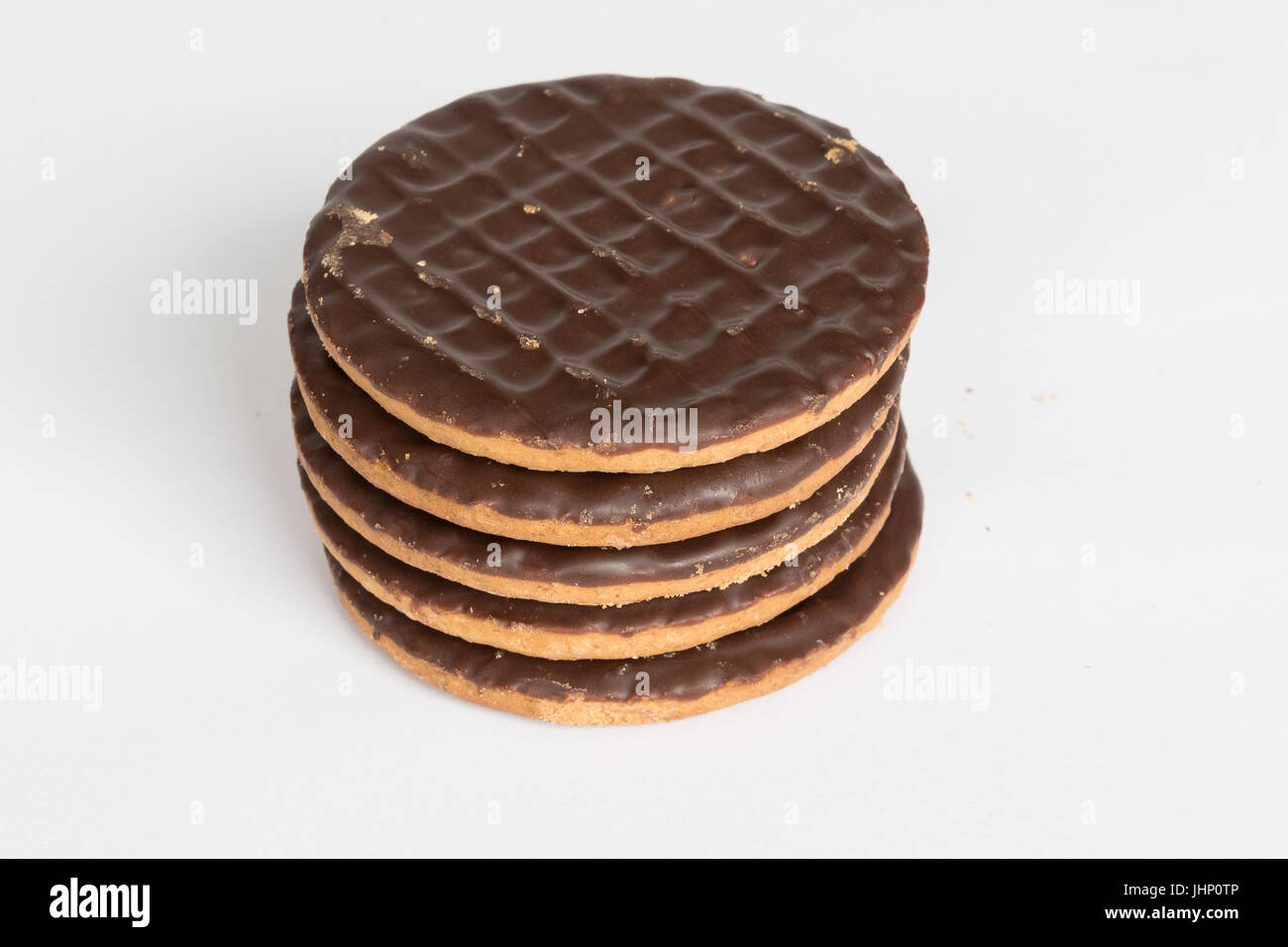 Plain Chocolate digestive biscuits isolated on a white background Stock Photo