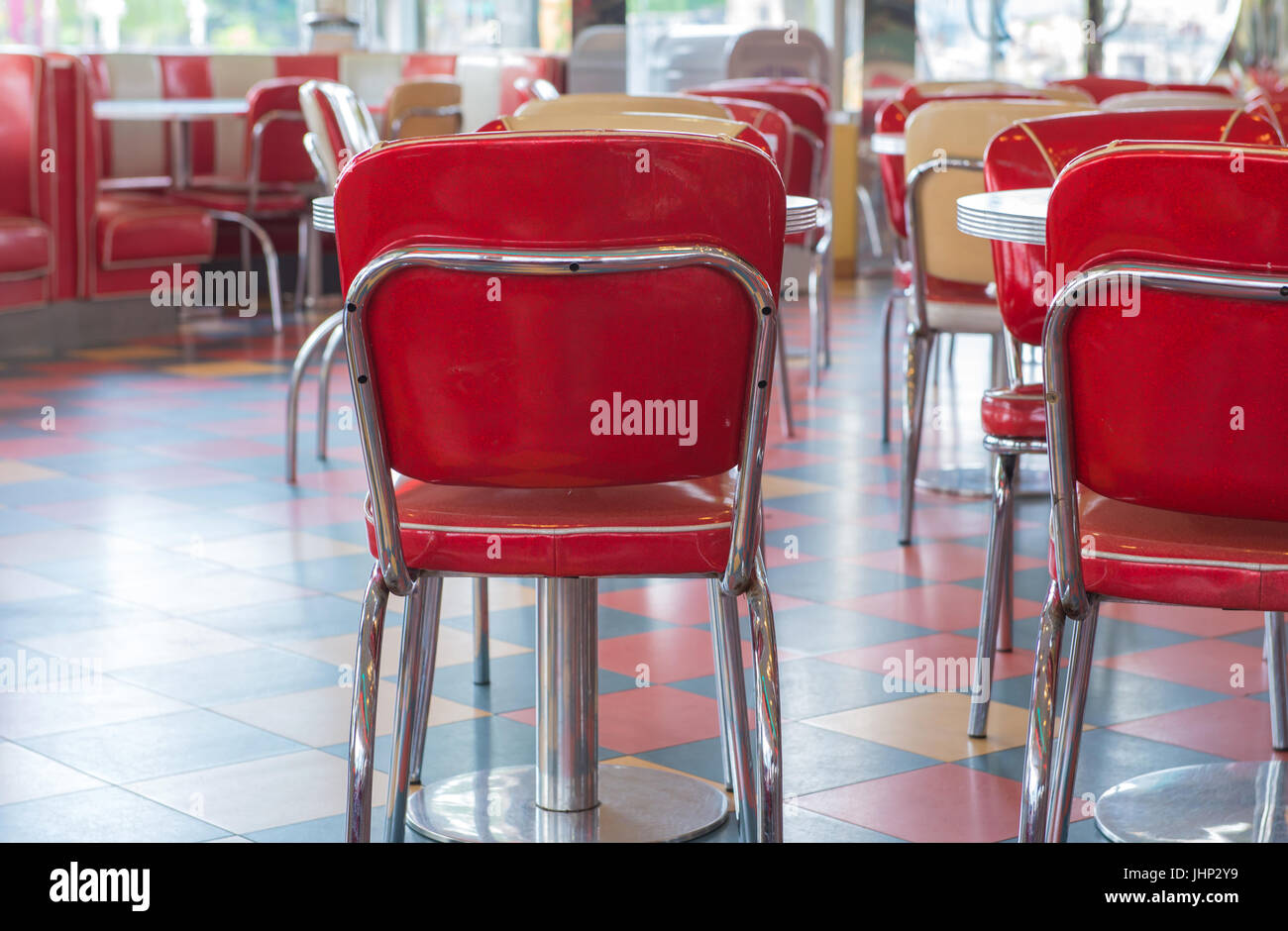 red table and chairs vintage style in restaurant Stock Photo Alamy