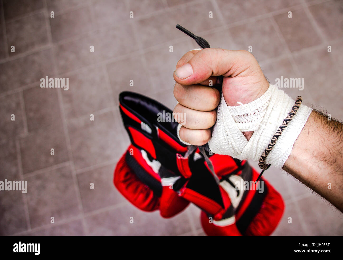 Photograph of a human fist and boxing gloves Stock Photo Alamy