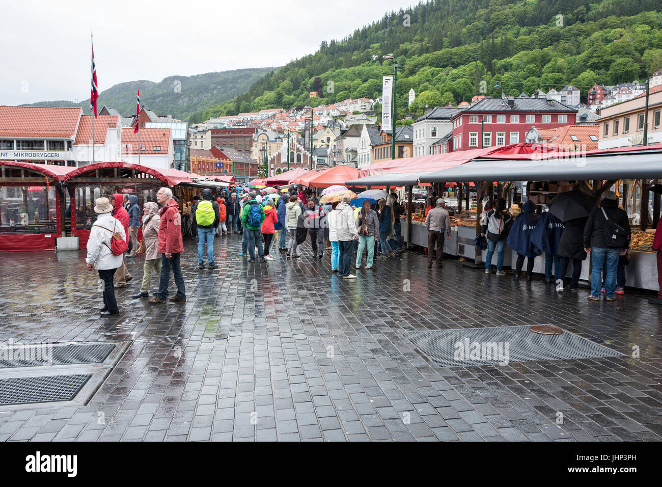 The picturesque Fish Market in Bergen is one of Norway's most visited outdoors markets. The Fish Market sells seafood, fruit and vegetables. Stock Photo