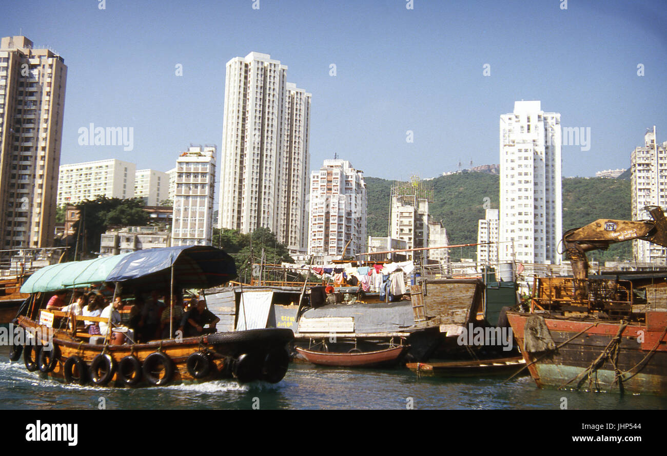 Contrasts of typical vessels; residences; Hong Kong; China Stock Photo
