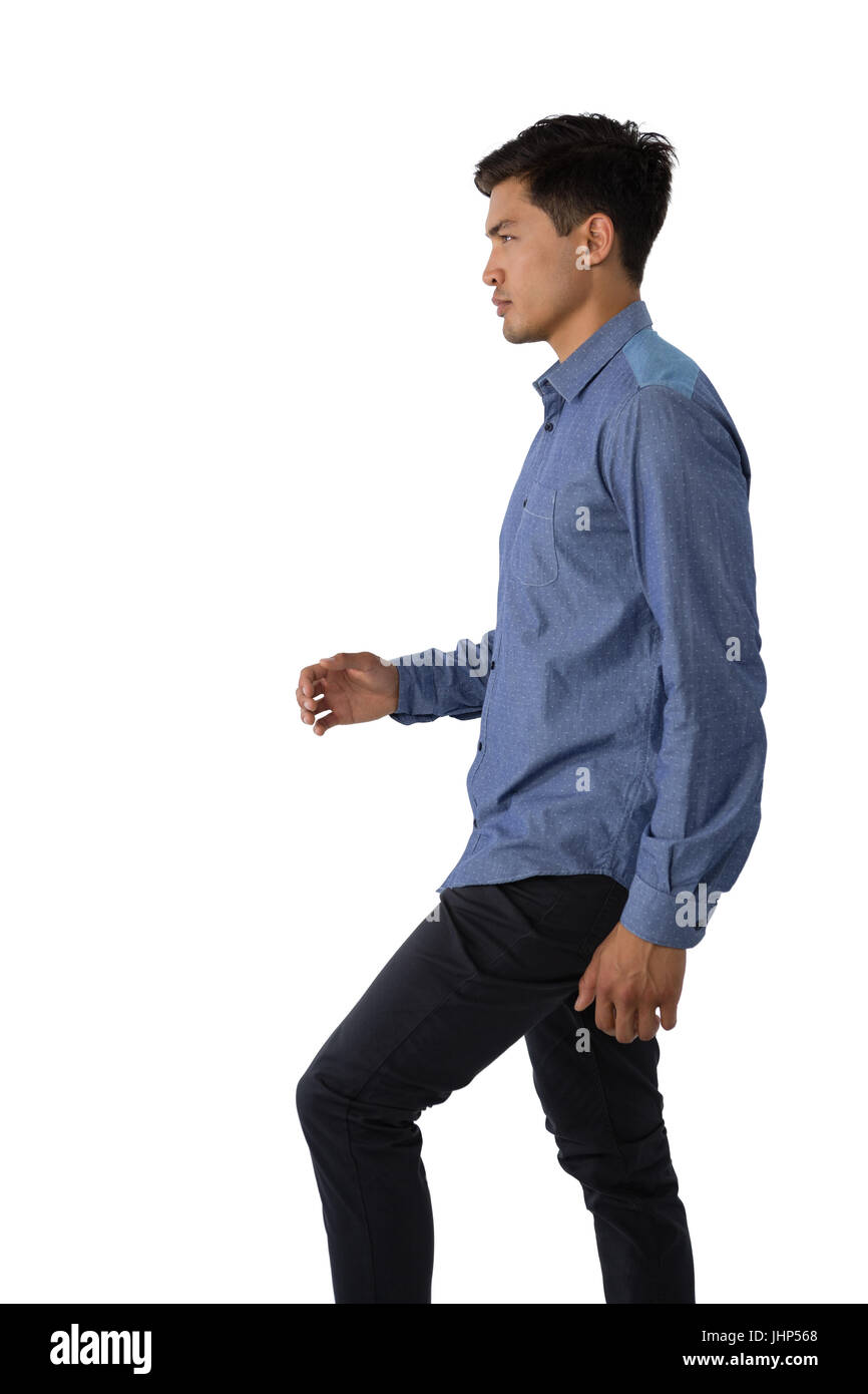 Man walking side view arms hi-res stock photography and images - Alamy