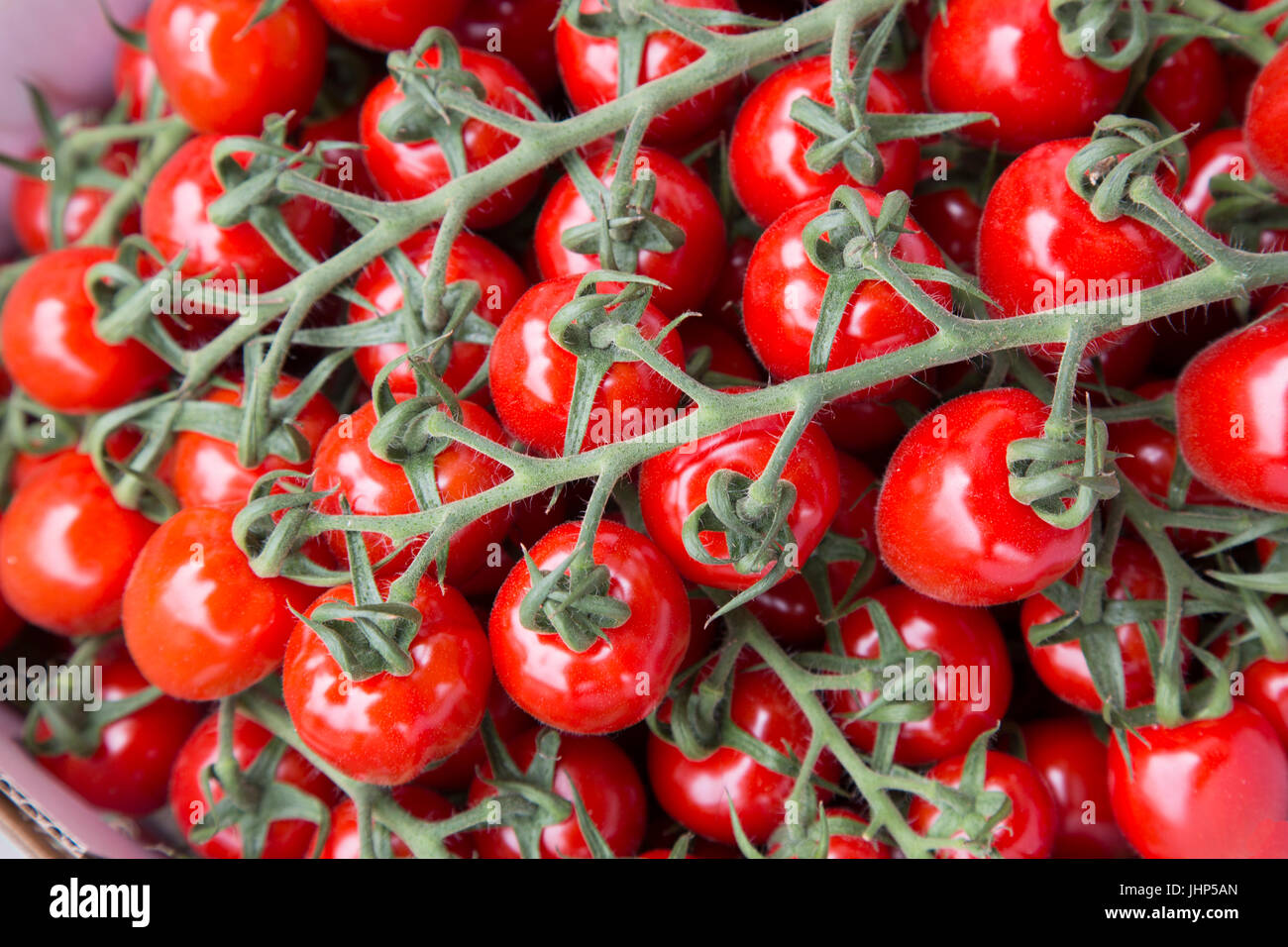 Cherry Tomato Background on Market Stall Stock Photo - Alamy