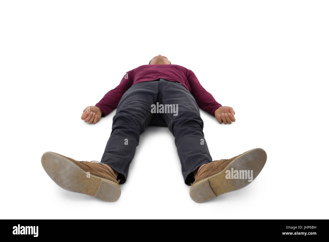 Full length of man lying down against white background Stock Photo