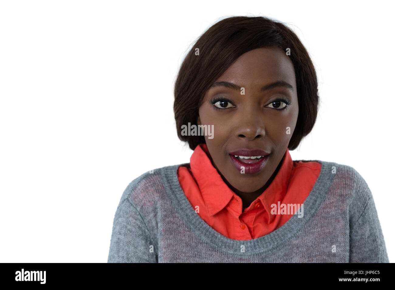 Close up portrait of surprised woman against white background Stock ...