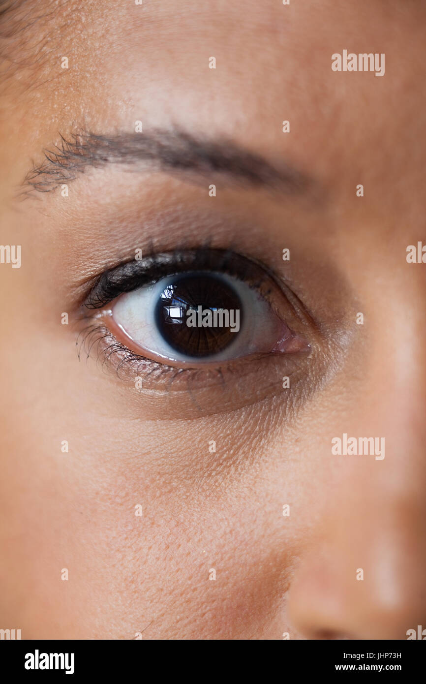 Close-up of womans eye with eyebrows Stock Photo