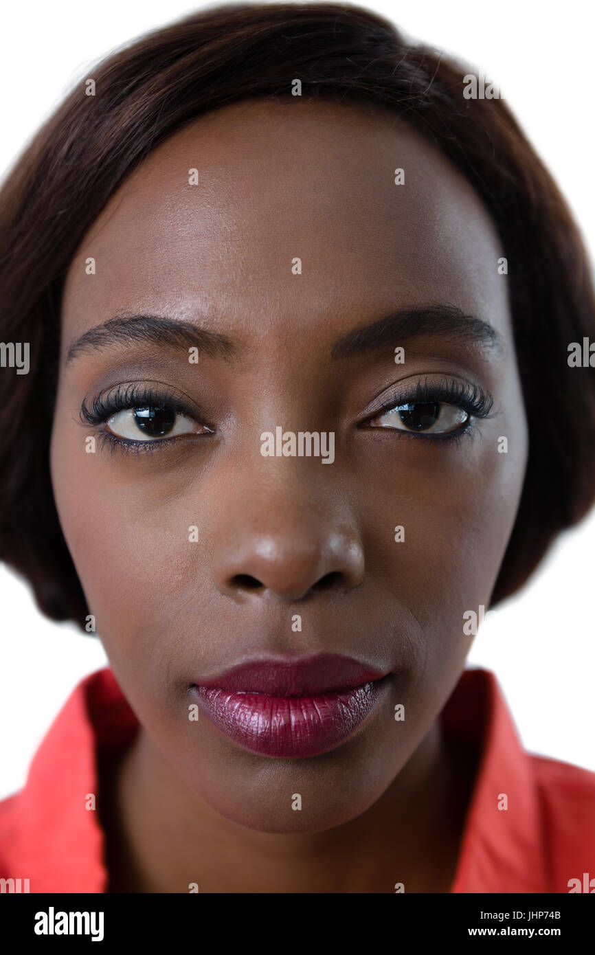 Close up portrait of young woman against white background Stock Photo ...