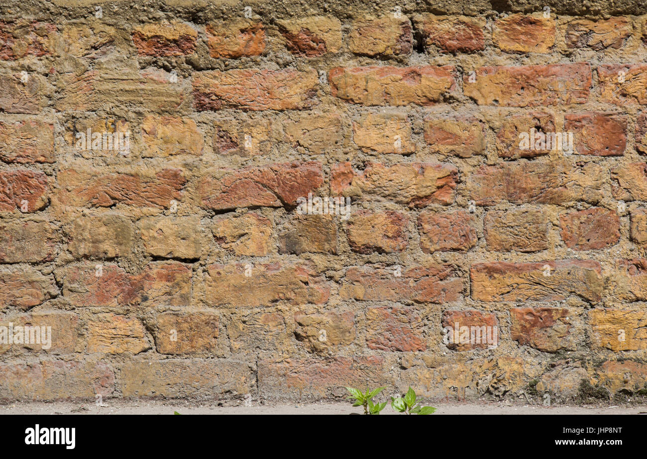 Old grunge brick wall as a background Stock Photo - Alamy