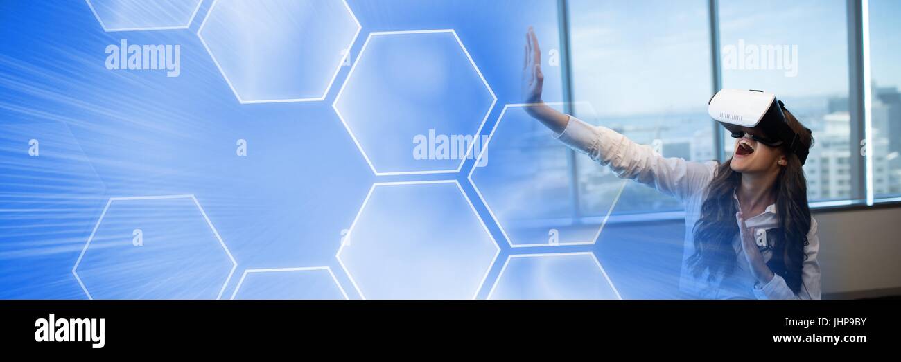 Digital composite of Woman Wearing VR Headset by windows with graphics ...