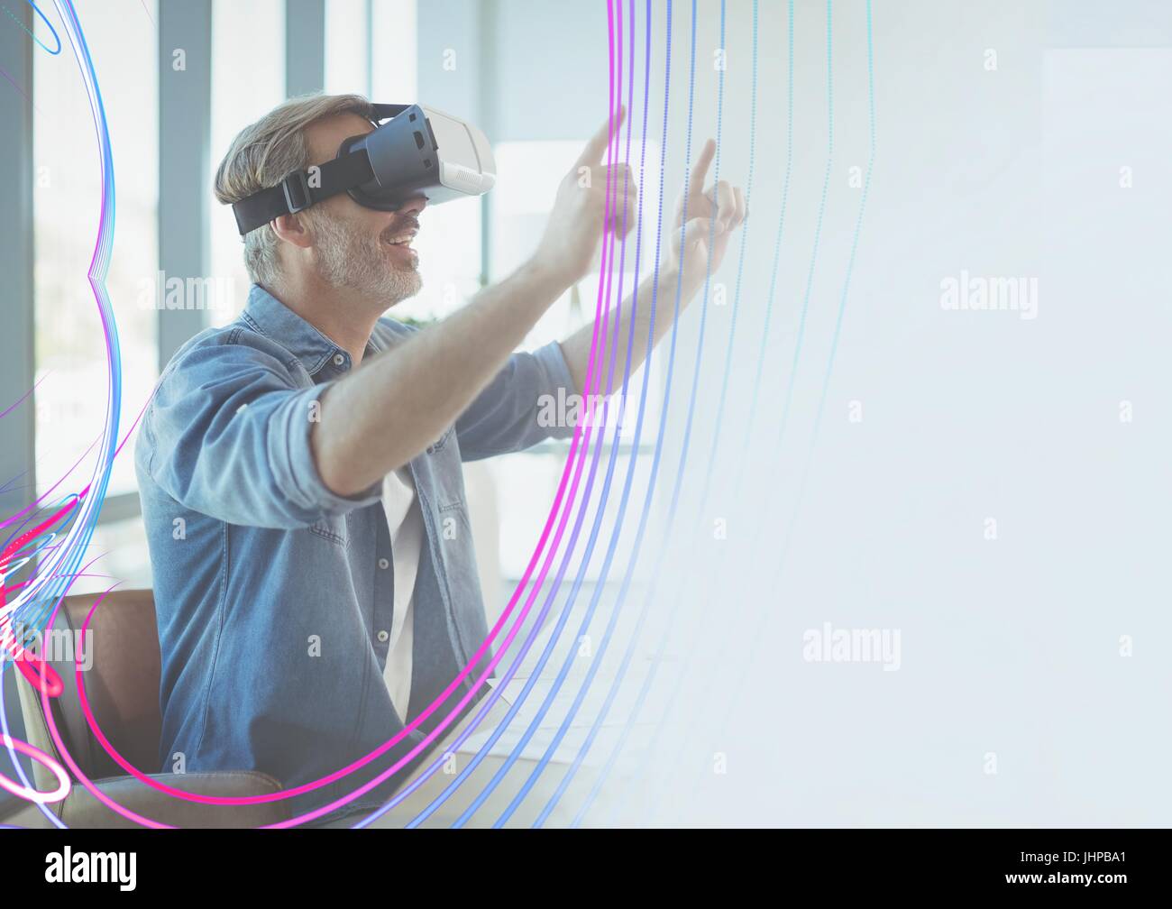 Digital composite of Excited man in VR headset touching clouds and ...