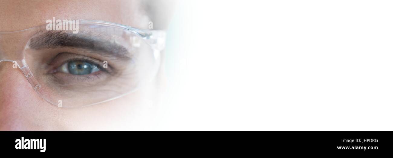 Digital composite of Close up of eye with glasses and blurry white