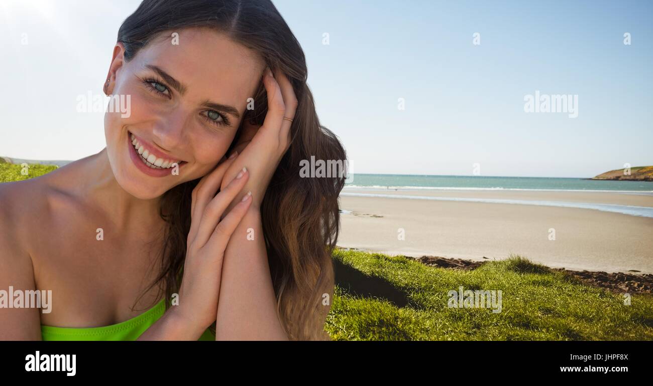 Digital composite of Woman at the beach smiling Stock Photo - Alamy