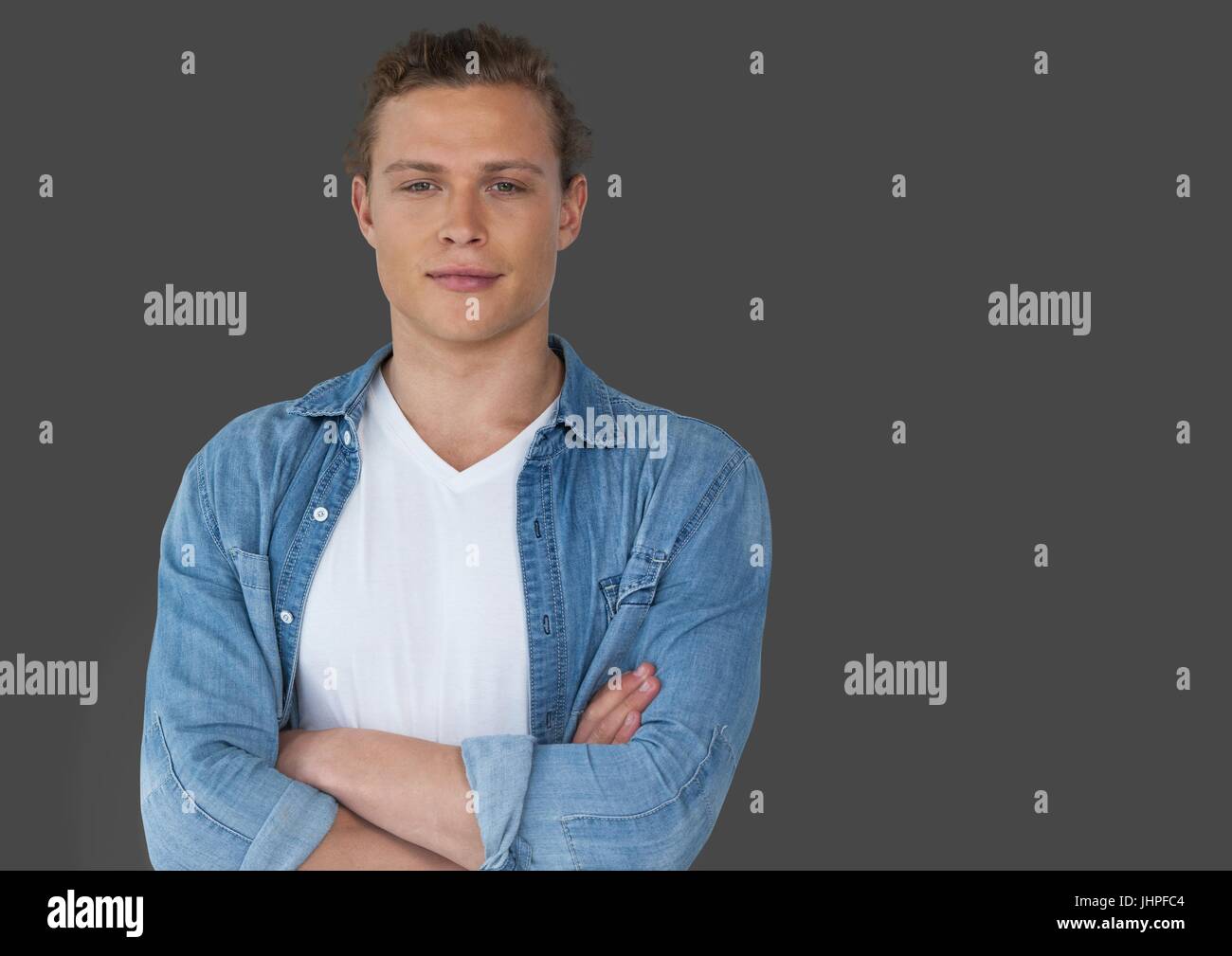 Digital composite of Portrait of Man with arms folded and grey ...